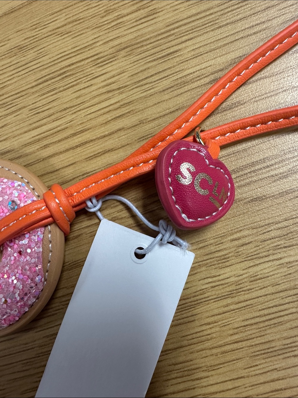Stoney Clover Lane Pink Glitter Donut Wristlet with Orange Strap - Picture 4 of 4